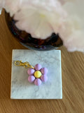 Porte Clé silicone Lilas centre jaune