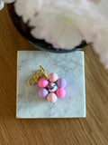 Porte Clé silicone Fleur Rose / Mauve centre fleuri